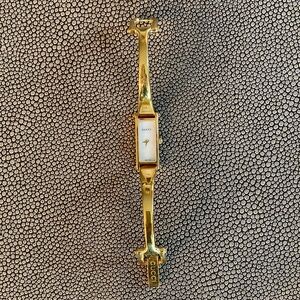 Gucci 1500L Wrist watch bracelet bangle gold plated with mother of pearl face.